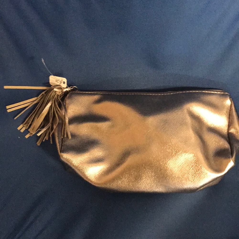 Brand new goldish make up bag